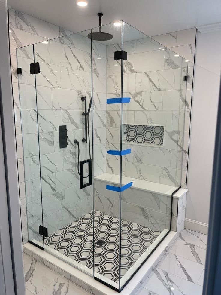 Custom frameless glass shower door installation